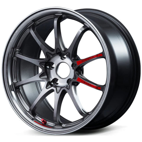 Photograph of a gunmetal gray Volk Racing CE28N-plus 10-spoke car rim isolated on white, featuring red Volk Racing branding and a red valve stem cap