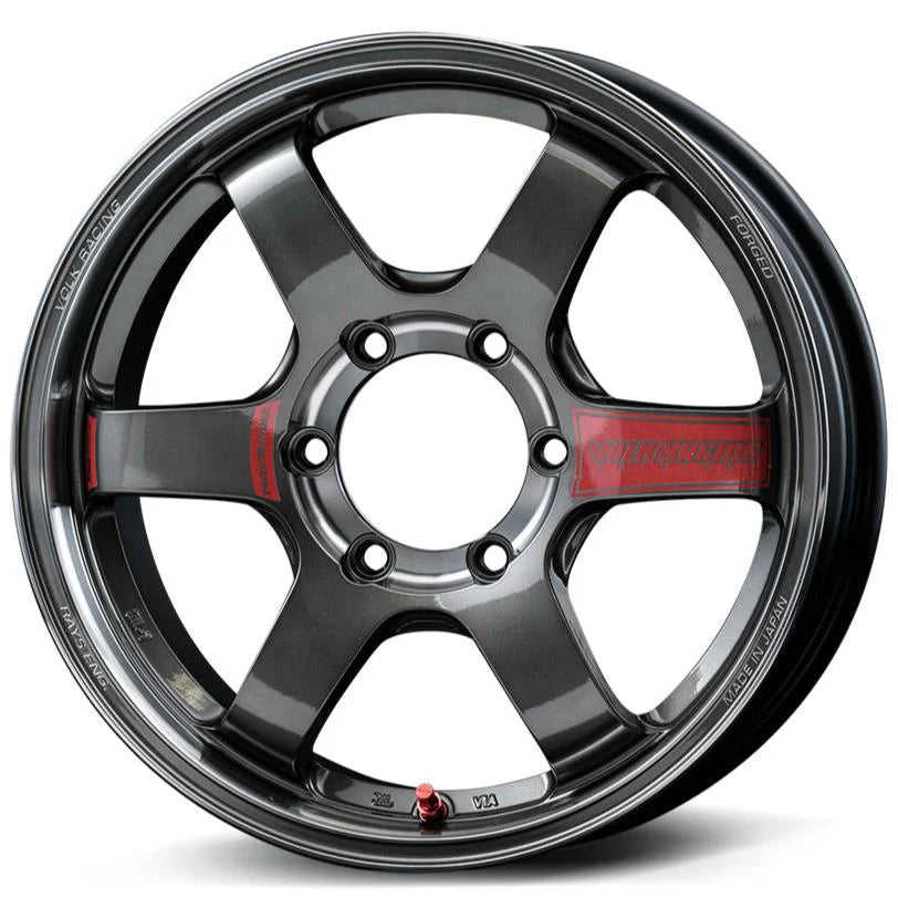 RAYS Engineering VOLK RACING forged alloy wheel in dark metallic grey with a six-spoke design accented by red VOLK RACING decals on two spokes and a distinct red valve stem made in Japan